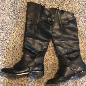 Tall black and brown boots